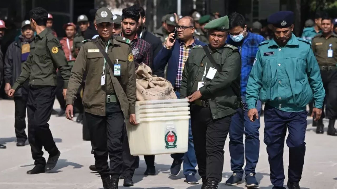 Ansar workers holding ballot boxes