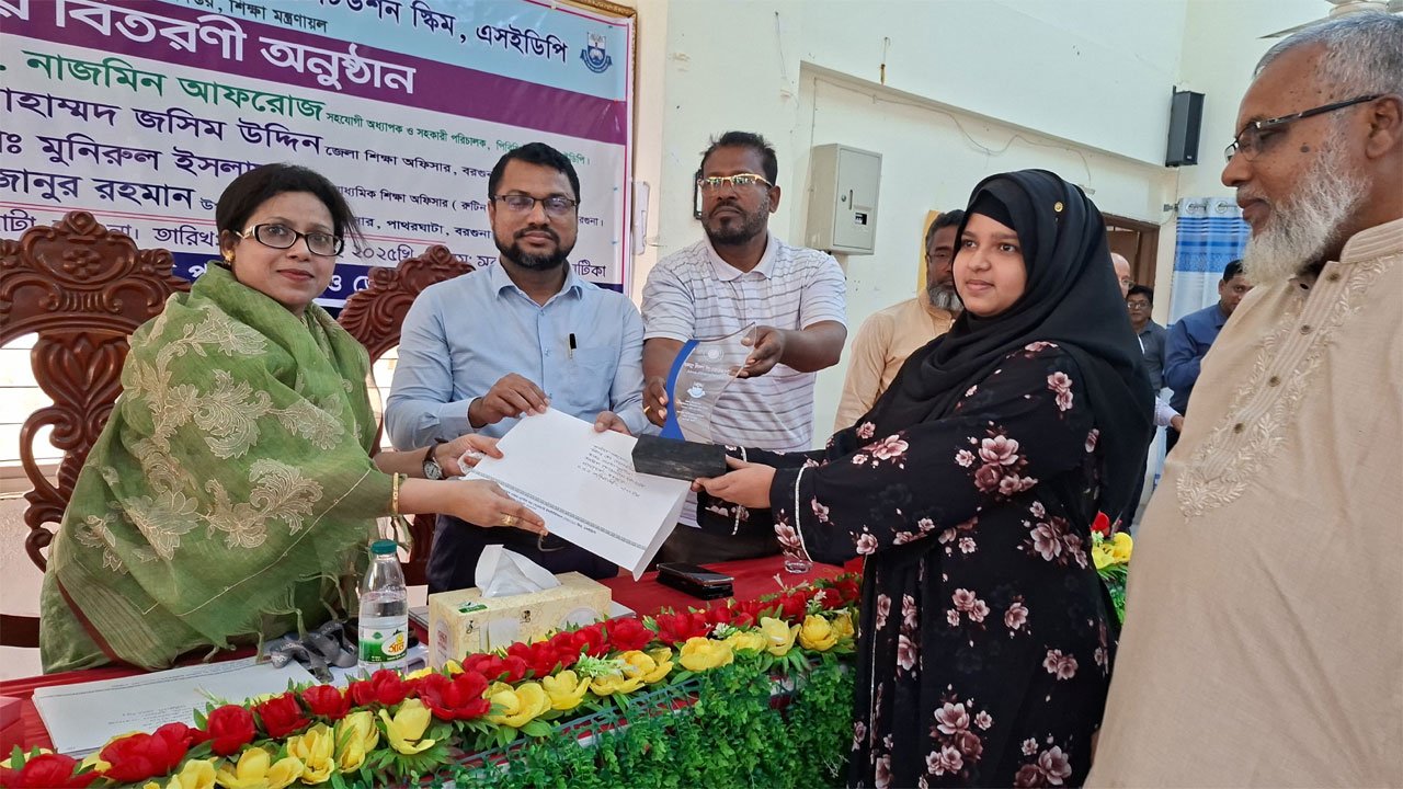 Honoring meritorious students in Patharghata.