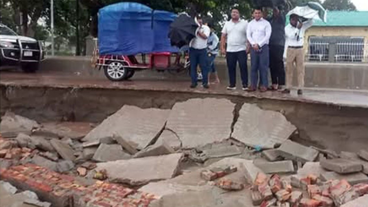 Road destroyed by tidal waves on the beach in Kuakata
