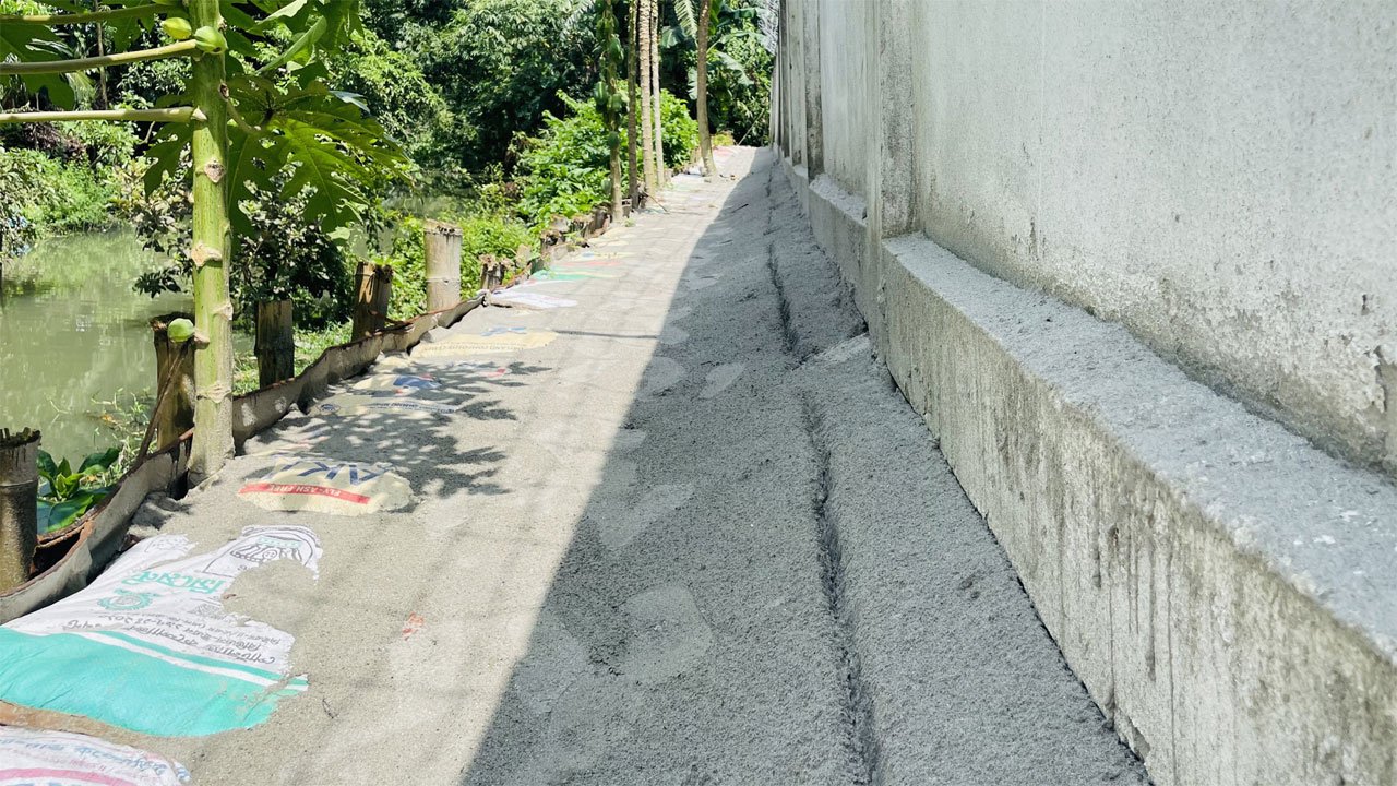 Sand is being thrown to protect the walls at Maulana Bhashani University of Science and Technology