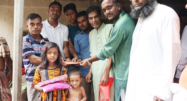 সিংড়ায় হিন্দু সম্প্রদায়ের মাঝে বিএনপির অর্থ সহায়তা