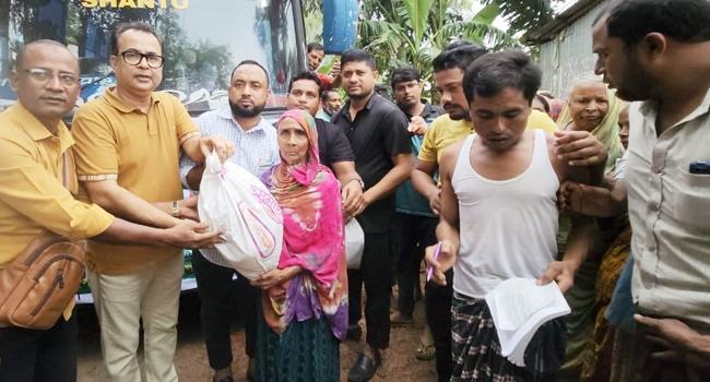 শেরপুরে বন্যার্তদের মাঝে রূপগঞ্জ প্রেসক্লাবের ত্রাণ বিতরণ