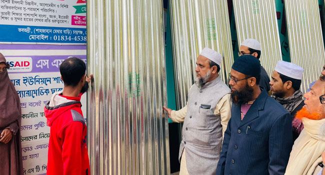 নোয়াখালীতে বন্যায় ক্ষতিগ্রস্তদের মাঝে জামায়াতের টিন বিতরণ