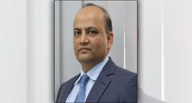 শেয়ারবাজার থেকে ৭০০ কোটি টাকা লুট করে ধরাছোঁয়ার বাইরে হাসান ইমাম