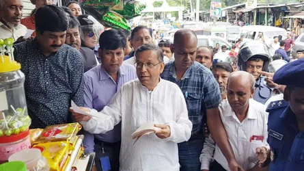 আইনমন্ত্রীর নির্বাচনী গণসংযোগ ও প্রচারপত্র বিতরণ