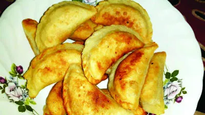 শীতে পিঠা পুলি