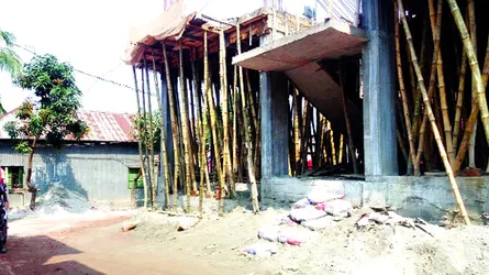 আশুলিয়ায় সরকারি সড়ক দখল করে বহুতল ভবন নির্মাণ