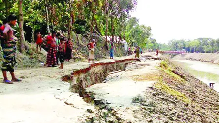 বালিয়াকান্দিতে অপরিকল্পিত নদী খনন : পাকা সড়কে ধস
