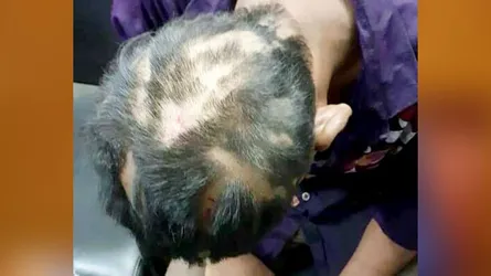 বাবা-মা নৌকায় ভোট দেয়ায় ছেলের চুল কেটে নেয়া হলো