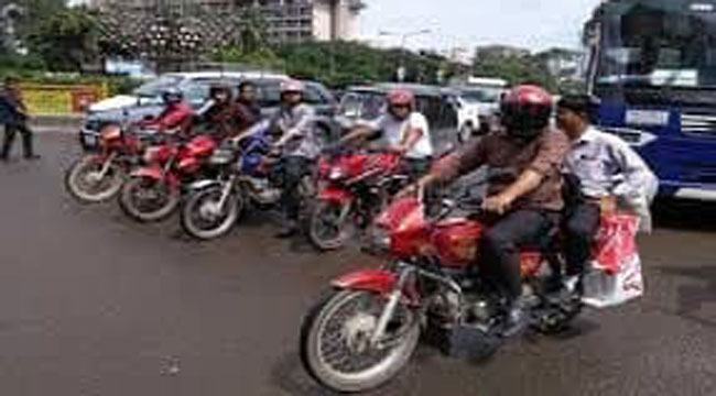 ঘাম ঝরান সড়কে মুখ লুকান আড়ালে
