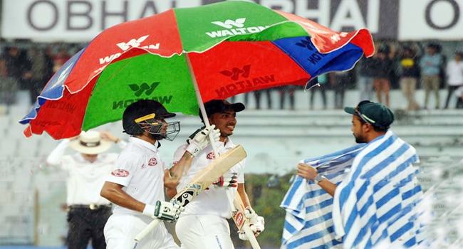 বৃষ্টিই এখন  বাংলাদেশের ‘ছাতা’