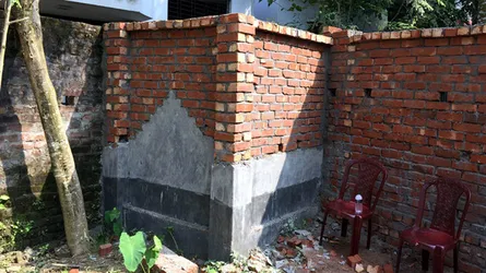 বাবার কবরের উপর বাথরুম নির্মাণ, কাজ বন্ধ করেছে প্রশাসন