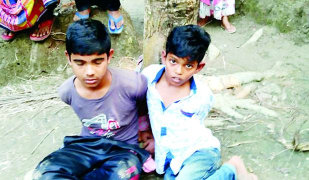 দুই শিশুকে গাছের সাথে বেঁধে নির্মম নির্যাতন