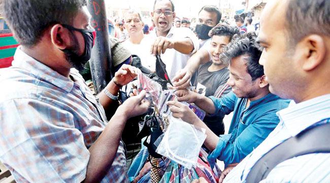 করোনা ও করুণা : মাস্ক ও মুনাফা