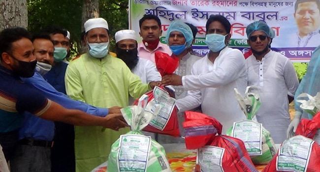 ফরিদপুরে বিএনপি নেতার পক্ষে ১২০০ পরিবারে খাদ্য বিতরণ