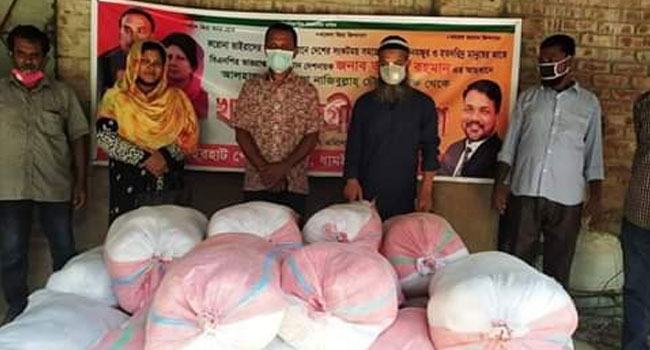 নওগাঁয় ৬ শ' কর্মহীন পরিবারের মাঝে বিএনপির খাদ্য সামগ্রী বিতরণ