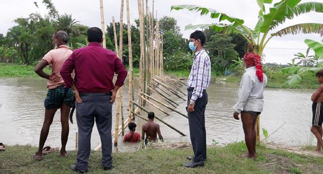 বালিয়াকান্দিতে হড়াই নদীর ও কানা বিলের অবৈধ বাঁধ অপসারণ