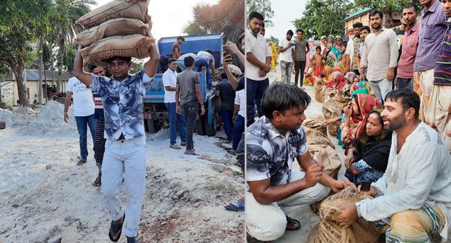 ত্রাণের বস্তা মাথায় নিয়ে বানভাসীদের পৌঁছে দিলেন সিংড়ার মেয়র