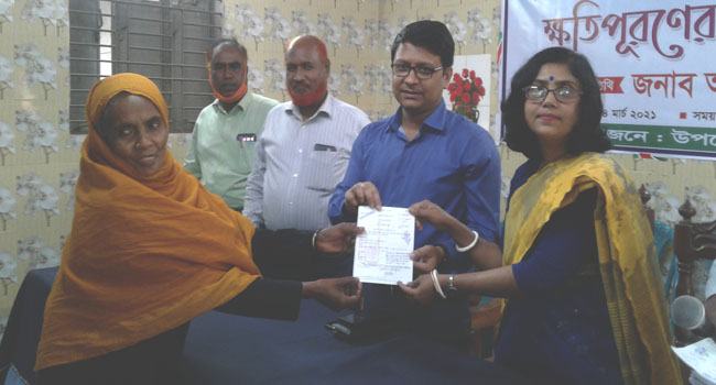 ফরিদপুরে পদ্মা সেতুতে রেল সংযোগ প্রকল্পের জমি অধিগ্রহণের চেক বিতরণ