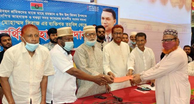 শেরপুরে বিএনপির অর্থ সহায়তা বিতরণ