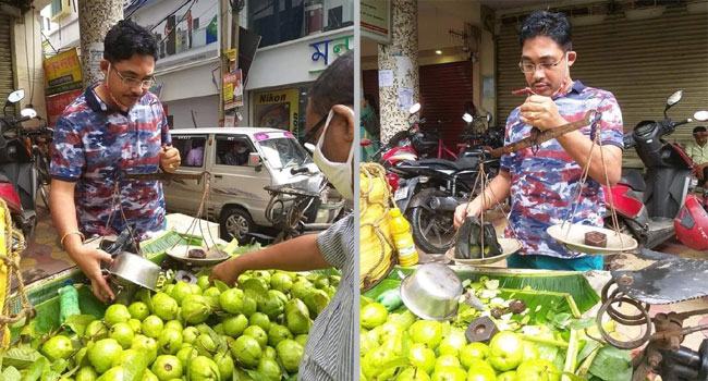 পুলিশ কর্মকর্তাকে দিয়ে পেয়ারা বেচালেন ভ্রাম্যমান দোকানদার!