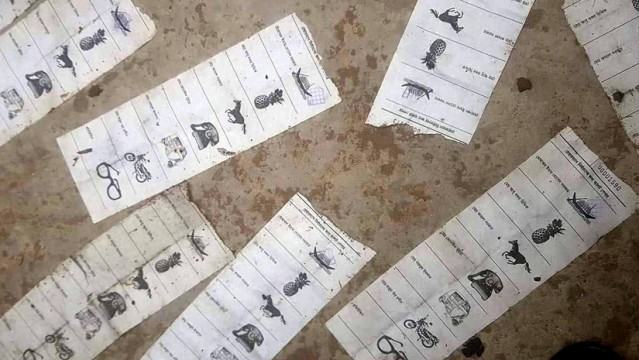 নৌকা প্রতীকে সিল দেয়া ব্যালট ভাসছে পানিতে