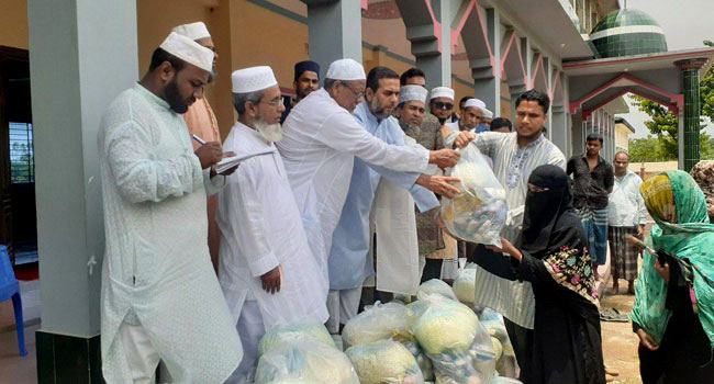 সিলেটে বন্যার্তদের মাঝে জামায়াতের ত্রাণসামগ্রী বিতরণ