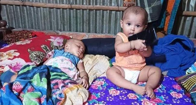 পাহাড়ধসে মা হারানো যমজ দু’বোনের ঠাঁই হলো দুই পরিবারে