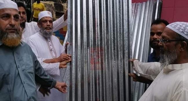 পটিয়ায় অগ্নিকাণ্ডে ক্ষতিগ্রস্তদের মাঝে জামায়াতের ঢেউটিন বিতরণ