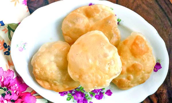 লুচি ফোলে কেন