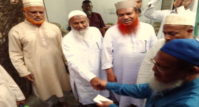 রাজশাহীতে ক্ষতিগ্রস্ত ব্যবসায়ীদের আর্থিক অনুদান প্রদান জামায়াতের