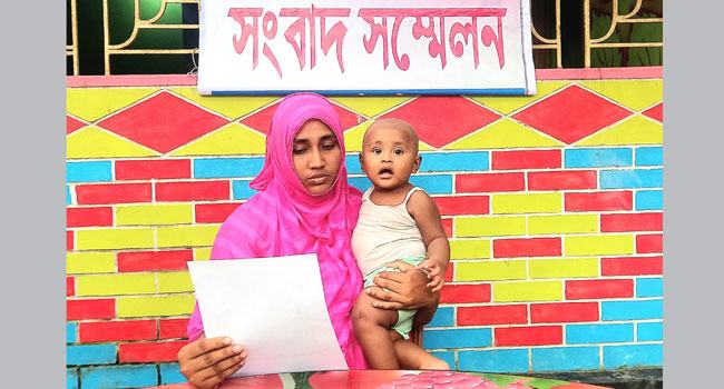 ‘মিথ্যা’ মামলায় স্বামী জেলে, আসামি না হয়েও শিশু-সন্তানসহ পালিয়ে বেড়াচ্ছেন স্ত্রী