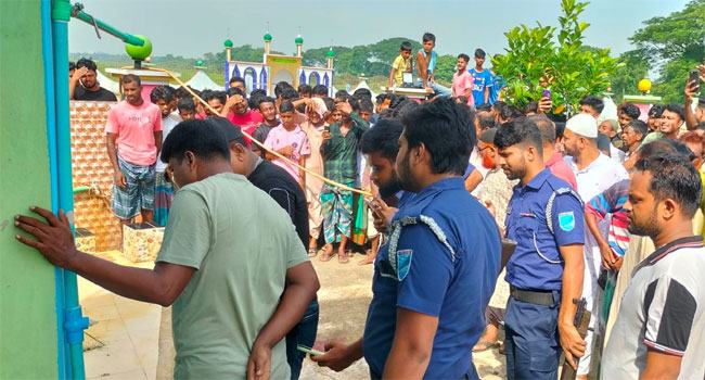 গজারিয়ায় কবরস্থান থেকে তরুণীর লাশ উদ্ধার
