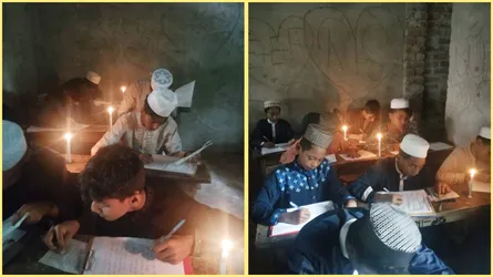 লালমোহনে মোমবাতির আলোয় পরীক্ষা দিচ্ছেন মাধ্যমিকের শিক্ষার্থীরা