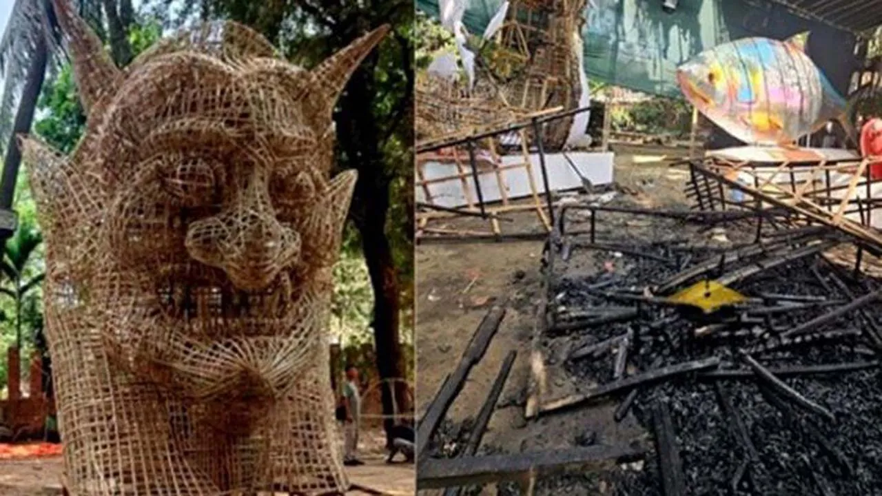 কালো মাস্ক পরা একজন ‘ফ্যাসিস্টের প্রতিকৃতি’তে আগুন দেন