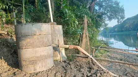 নগরকান্দায় কুমার নদে সেপটিক ট্যাংক উচ্ছেদ, জরিমানা