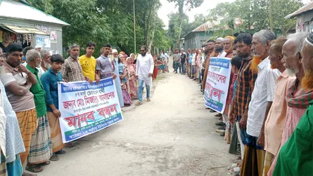মাদারগঞ্জে মিথ্যা মামলা প্রত্যাহারের দাবিতে মানববন্ধন