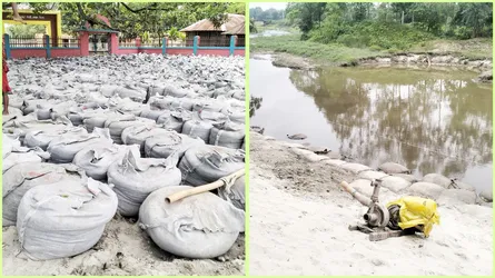 নীলফামারীতে নদীর এক তীরের বালু দিয়ে অপর তীরে প্রটেকশন বাঁধ নির্মাণ