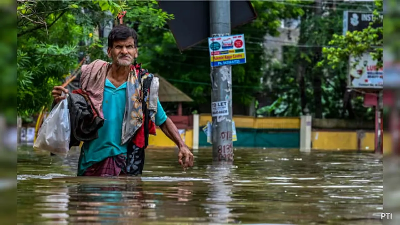 আসামে বন্যায় মৃতের সংখ্যা বেড়ে ৬৬