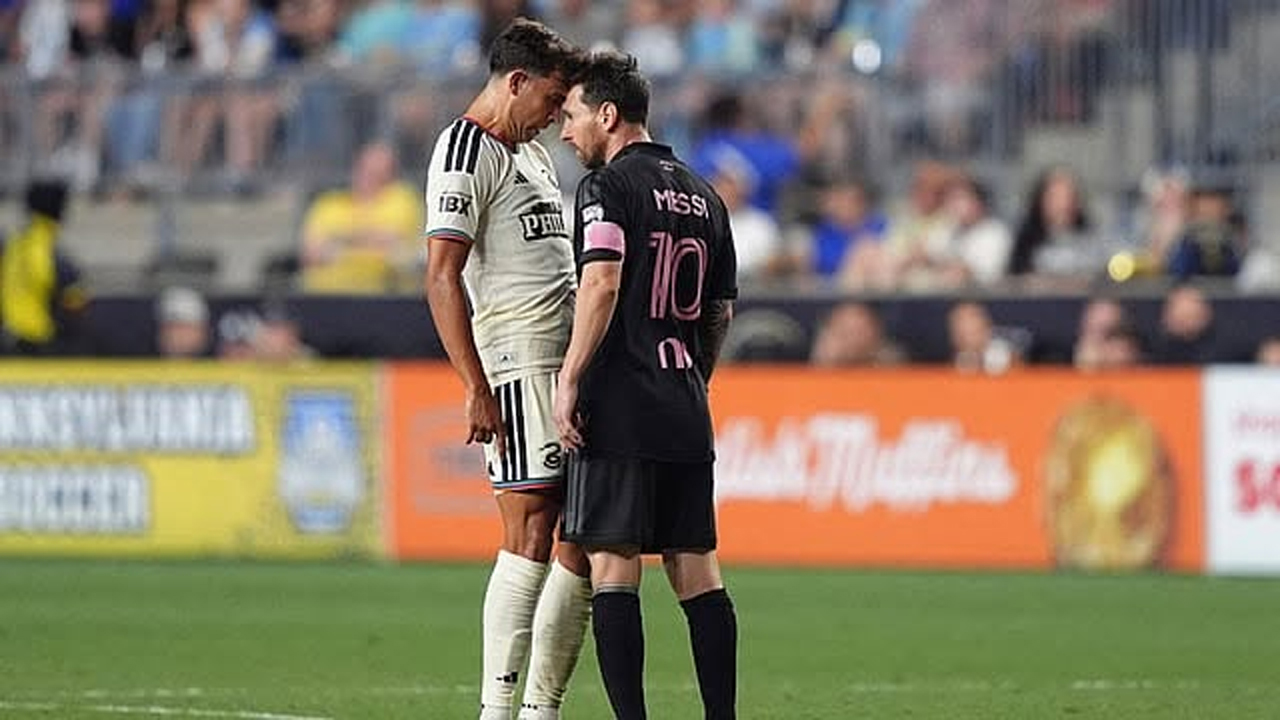 কুইন সলিভান ও লিওনেল মেসি