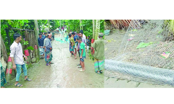 সড়কে ঢালাইয়ের কাজ চলছে চিকন জিআই তারের নেট দিয়ে : নয়া দিগন্ত